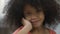 Beautiful Afro-American kid smiling at camera, positive emotions, closeup