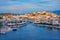 Beautiful Agios Nikolaos town on lake Voulismeni on sunset. island Crete, Greece