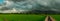 Beautiful Agricultural Landscape With Background Western Ghat Mountains with Dark Rainy Clouds in India. South India Landscapes