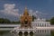 The beautiful Aisawan Dhiphya Asana pavilion inside the Royal Palace of Bang Pa In, Thailand, with reflection on the water