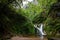 Beautiful allerheiligen waterfall in the forest. Germany Black Forest. Long quote exposure and trees. Cliff river