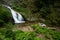 Beautiful allerheiligen waterfall in the forest. Germany Black Forest. Long quote exposure and trees. Cliff river