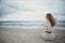 Beautiful alone girl on the beach