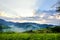 The Beautiful alpine meadow with green grass. sunrise. landscape on wild transylvania hills. Holbav. Romania. Low key, dark backgr