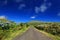 Beautiful alpine road on Flores Island in a sunny day