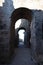 Beautiful ancient old stone arch corridor in the ruins of Pergamon city in Turkey