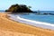 beautiful andilana beach seaweed in indian house sky and rock