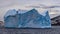 Beautiful antarctic landscape with iceberg and mountains