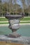 Beautiful Antique Bronze Vases in Gardens of Versailles palace, Paris