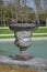 Beautiful Antique Bronze Vases in Gardens of Versailles palace, Paris