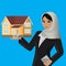 Beautiful arabic muslim woman with house on hand