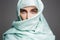 Beautiful arabic woman in a blue cloth