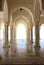 Beautiful arch, columns and marble floor.