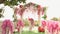 A beautiful arch in pink colors prepared for wedding ceremony