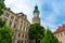 Beautiful architecture of the fire watch tower in Sopron Hungary with green trees around it