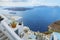 Beautiful architecture of the greek houses and romantic panoramic view on caldera and vulcan. Santorini (Thira) island