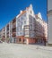 Beautiful architecture of market square with elegant historic living house with sgraffito  in Legnica, Poland, hot day in May