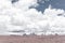 Beautiful arid landscape with snowy mountains and cloudy sky in Peruvian Altiplano near Colca Canyon, Peru