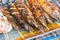 beautiful aromatic grilled fish on skewers close-up