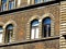 Beautiful artistic yellow, golden and brown stucco neo renaissance facade detail