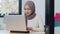 Beautiful Asia muslim lady casual wear working using laptop in modern new normal office. Working from home, remotely work, self
