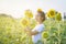 Beautiful Asia woman enjoy flowers in garden outdoor at countryside of Thailand