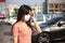 Beautiful asia woman wearing mouth mask against air smog pollution PM 2.5 and Coronavirus in the community,bangkok thailand