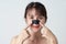 Beautiful Asian female model with mask charcoal deep cleansing nose pore strip on fresh clean skin