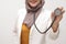 Beautiful Asian muslim female medical doctor wearing hijab want to make examination with stethoscope, smiling to camera