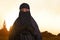 Beautiful asian muslim female in veil with niqab standing