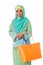 Beautiful asian muslimah woman with bright orange wicker tote ba
