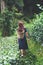 A beautiful asian woman picking tea leaf in a highland tea plantation