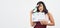 Beautiful asian woman with tan skin and hand`s holding clapper board or movie slate use in video production ,film, cinema ,movies