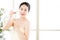 Beautiful asian women enjoy natural clean water after shower
