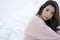 Beautiful Asian young smiling woman warm sweater pink cold and r