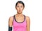 Beautiful asian young sport woman wearing sportswear and arm band making fish face with lips, crazy and comical gesture