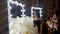 Beautiful asian young woman and decorative ostrich feathers on a gold table next to a make-up mirror