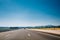 Beautiful asphalt road, freeway, motorway, highway under sunny b