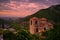 The beautiful Assen Fortress and the church "St. Bogoroditsa Petrichka" at sunset. Europe, Bulgaria, Asenovgrad