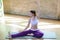 Beautiful athletic young girl make yoga practice indoor, relax time