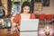 Beautiful Attractive Business Asian woman working with laptop and looking in monitor smile and have positive emotional