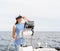 Beautiful, attractive young girl pilots a boat Mediterranean Sea