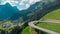 Beautiful austrian valley with village of Oberboden close to a nice road bridge with a hairpin turn on it with magnificent