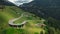 Beautiful austrian valley with village of Oberboden close to a nice road bridge with a hairpin turn on it with magnificent