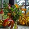 Beautiful autumn bouquet on the windowsill, flowers, leaves, berries, ablocks