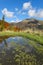 Beautiful autumn colors in alpine pond