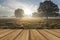 Beautiful Autumn dawn countryside landscape with wooden planks f