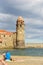 Beautiful autumn day in the tourist city of Colliure in Occitania whit on back the church of Notre dames des Anges, France