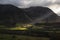 Beautiful Autumn Fall landscape view along valley towards Mellbreak and Grasmoor in Lake District with vibrant epic lighting in