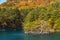 Beautiful autumn foliage scenery landscapes. View from Lake Towada sightseeing Cruise ship